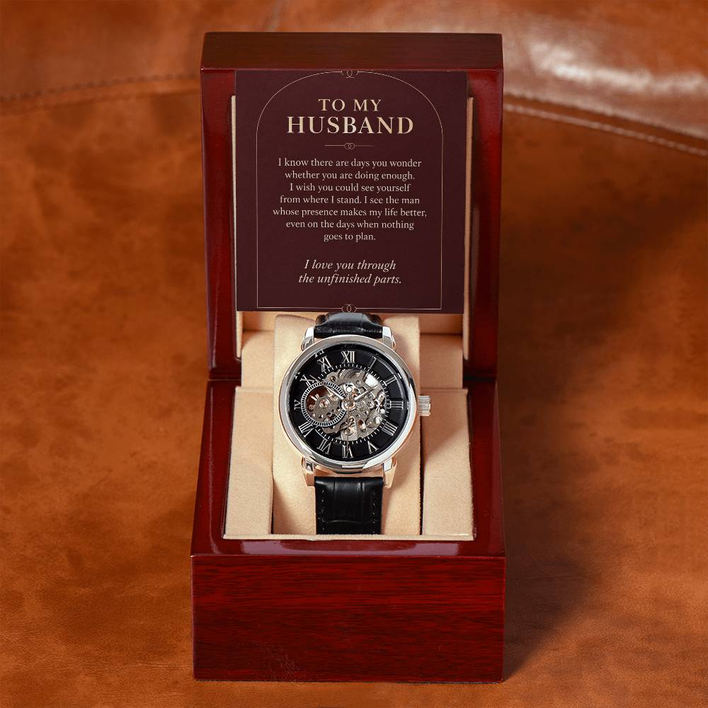 Black leather openwork watch for husband – open gift box with message card on brown leather | Hensley London