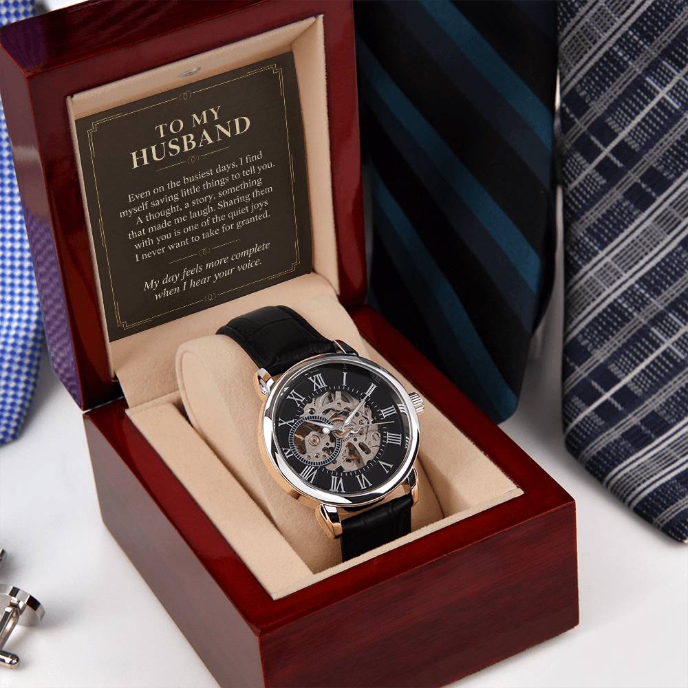 Black leather openwork watch for husband – angled gift box beside a necktie | Hensley London