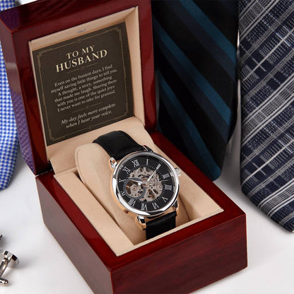 Black leather openwork watch for husband – angled gift box beside a necktie | Hensley London