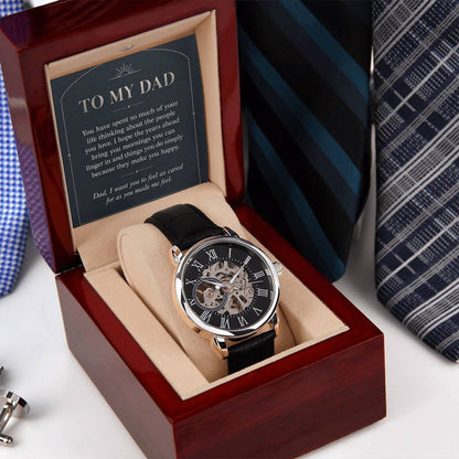 Black leather openwork watch for father – angled gift box beside a necktie | Hensley London