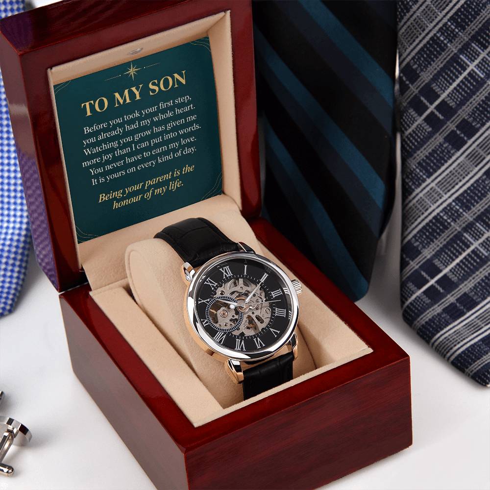 Black leather openwork watch for son – angled gift box beside a necktie | Hensley London