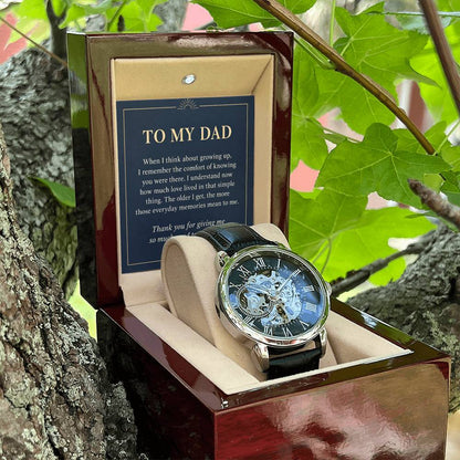 Black leather openwork watch for father – open gift box among foliage | Hensley London
