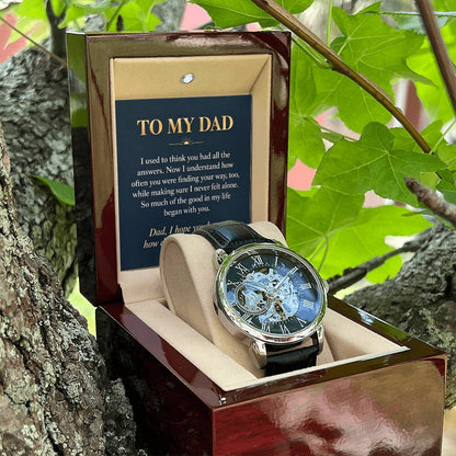 Black leather openwork watch for father – open gift box among foliage | Hensley London