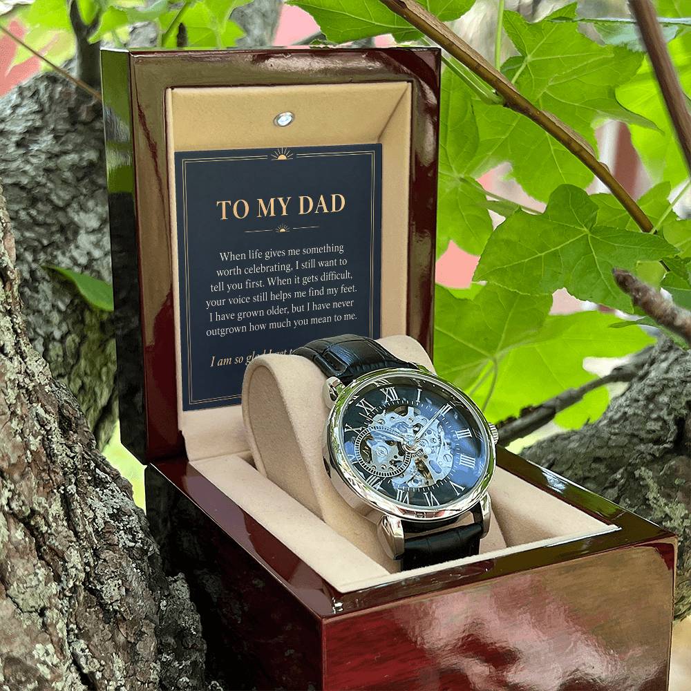Black leather openwork watch for father – open gift box among foliage | Hensley London