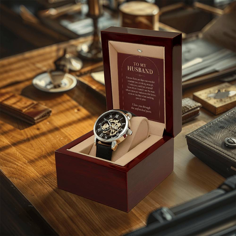 Black leather openwork watch for husband – watch and message card in a gift box on a desk | Hensley London