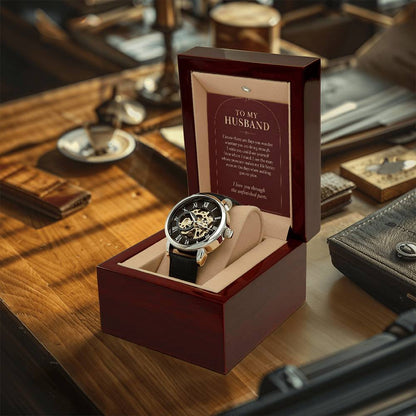 Black leather openwork watch for husband – watch and message card in a gift box on a desk | Hensley London
