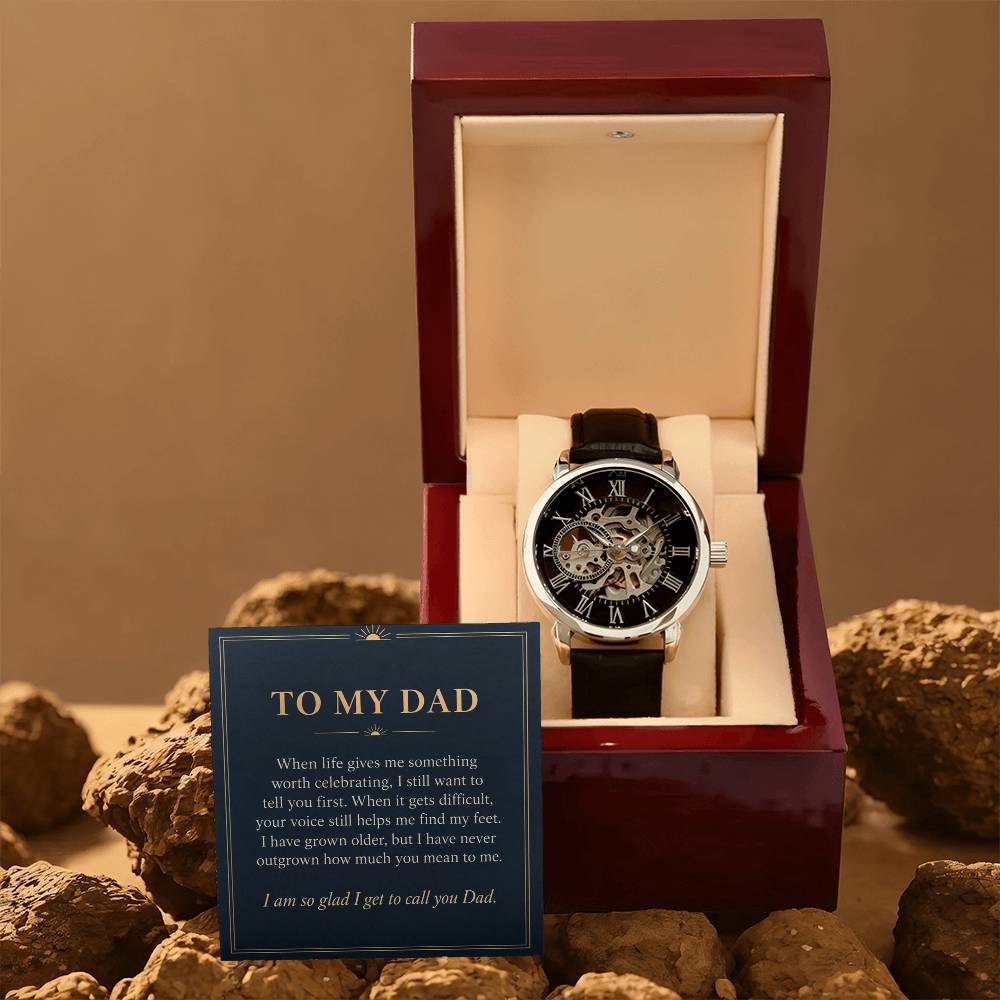 Black leather openwork watch for father – gift box and message card on a rocky backdrop | Hensley London