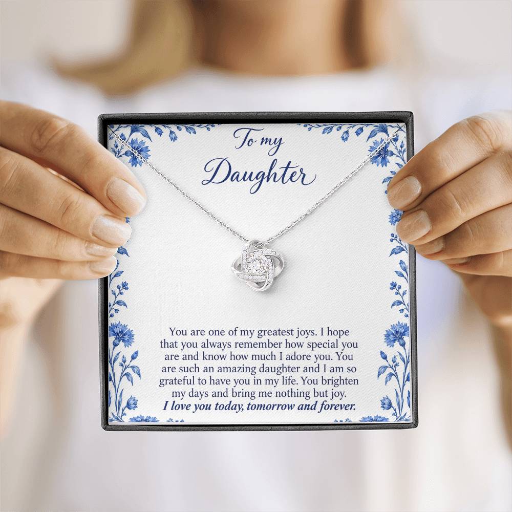 Love Knot necklace with Blue Porcelain daughter message card – white gold finish necklace in Standard Box held in hand | Hensley London