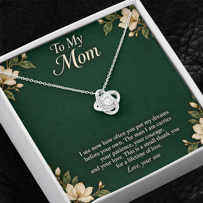 White-gold Love Knot necklace and emerald Mom message card in two-tone box | Hensley London