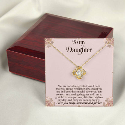 Love Knot necklace with Blush Art Deco daughter message card – yellow gold finish necklace and card beside Luxury Box | Hensley London