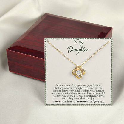 Love Knot necklace with Sage Gingham daughter message card – yellow gold finish necklace and card beside Luxury Box | Hensley London