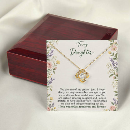 Love Knot necklace with Heirloom Garden daughter message card – yellow gold finish necklace and card beside Luxury Box | Hensley London