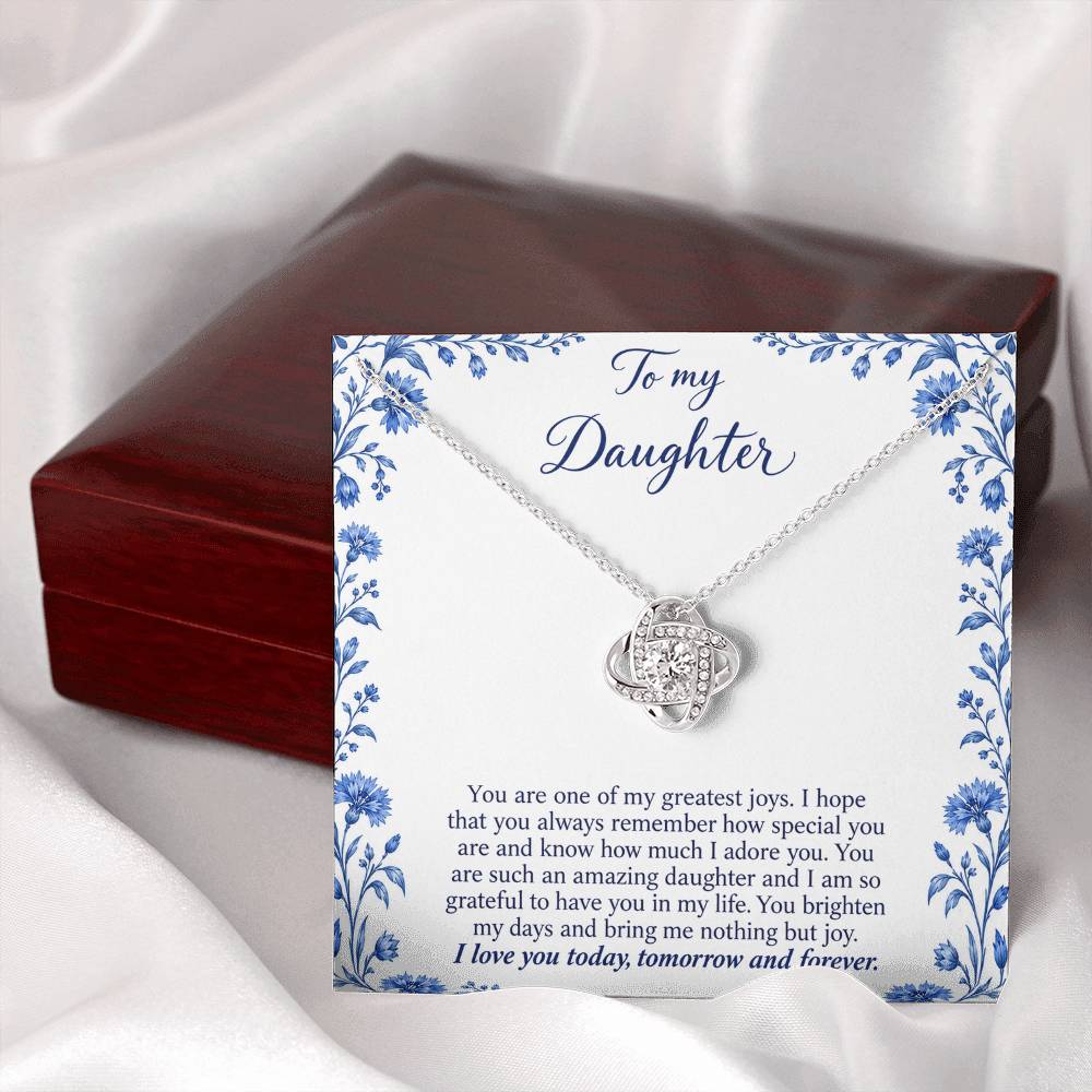 Love Knot necklace with Blue Porcelain daughter message card – white gold finish necklace and card beside Luxury Box | Hensley London