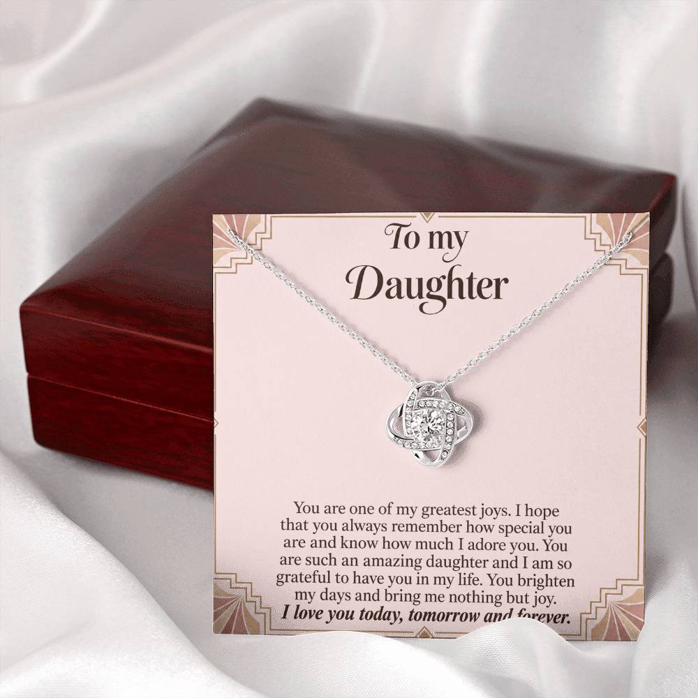 Love Knot necklace with Blush Art Deco daughter message card – white gold finish necklace and card beside Luxury Box | Hensley London