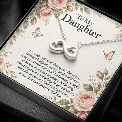 Gift for Daughter Endless Love Infinity Heart Necklace in white gold finish – standard box and message card close-up | Hensley London