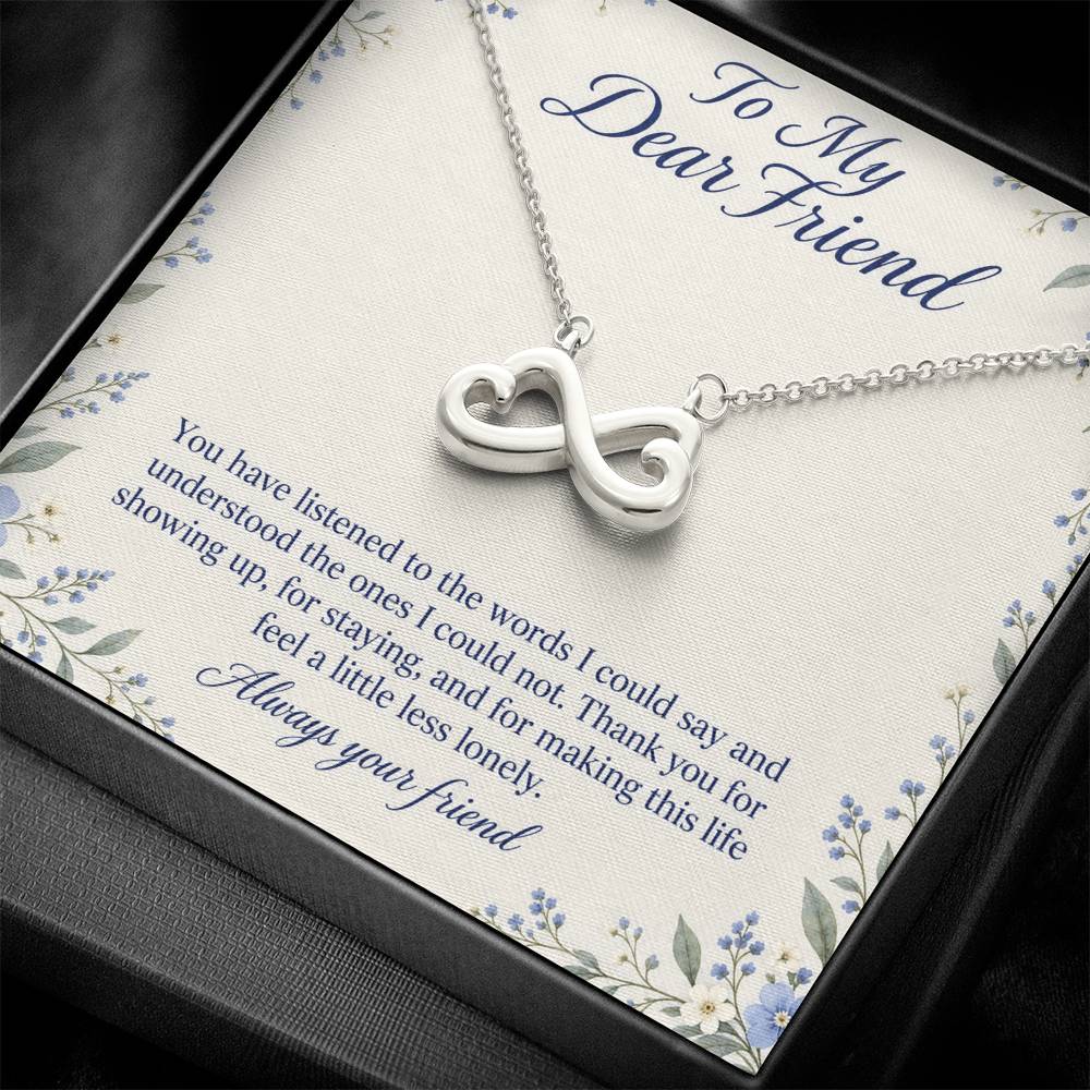 White-gold Endless Love infinity necklace and floral Friend message card in standard box, close view | Hensley London