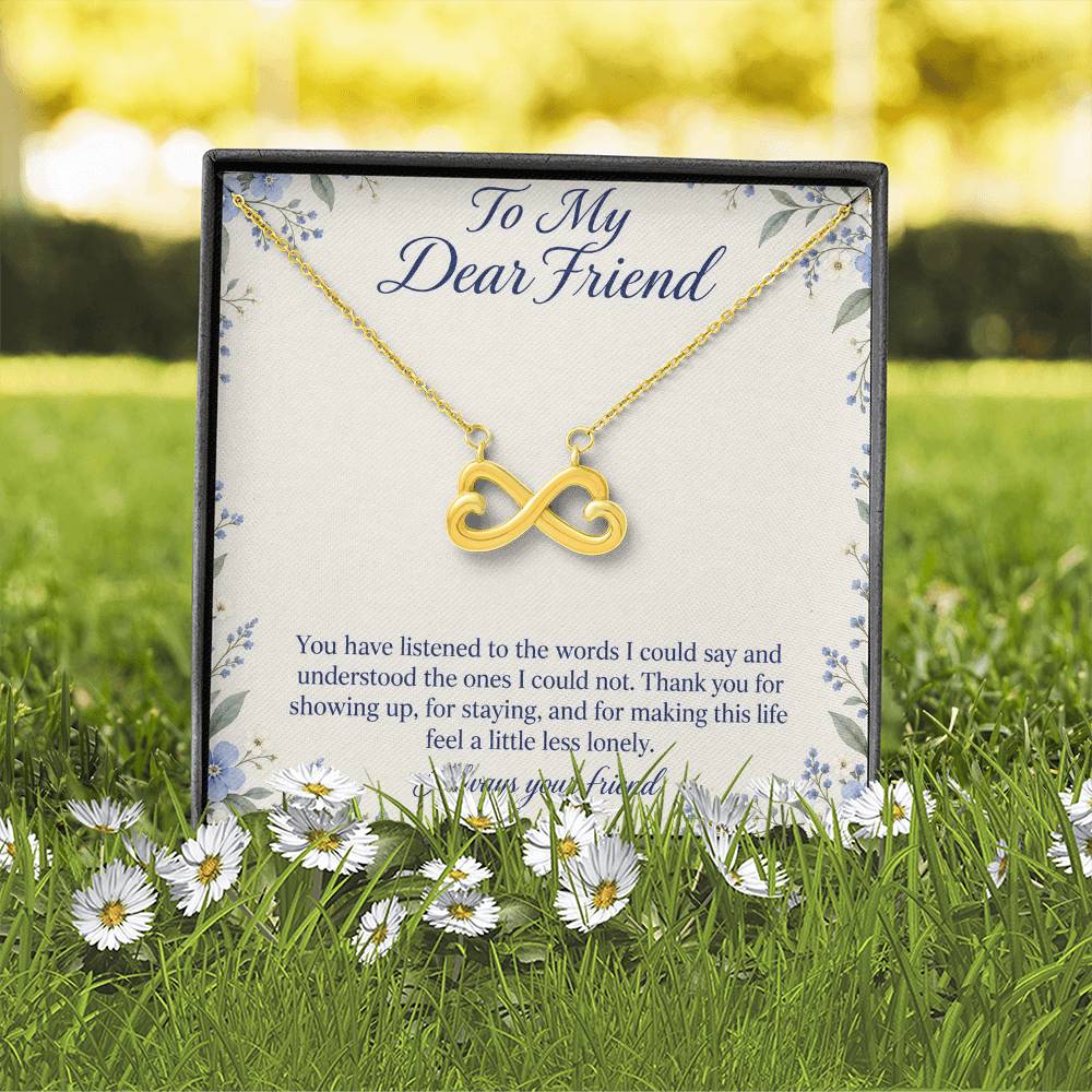 Yellow-gold Endless Love infinity necklace and Friend message card in standard box outdoors | Hensley London