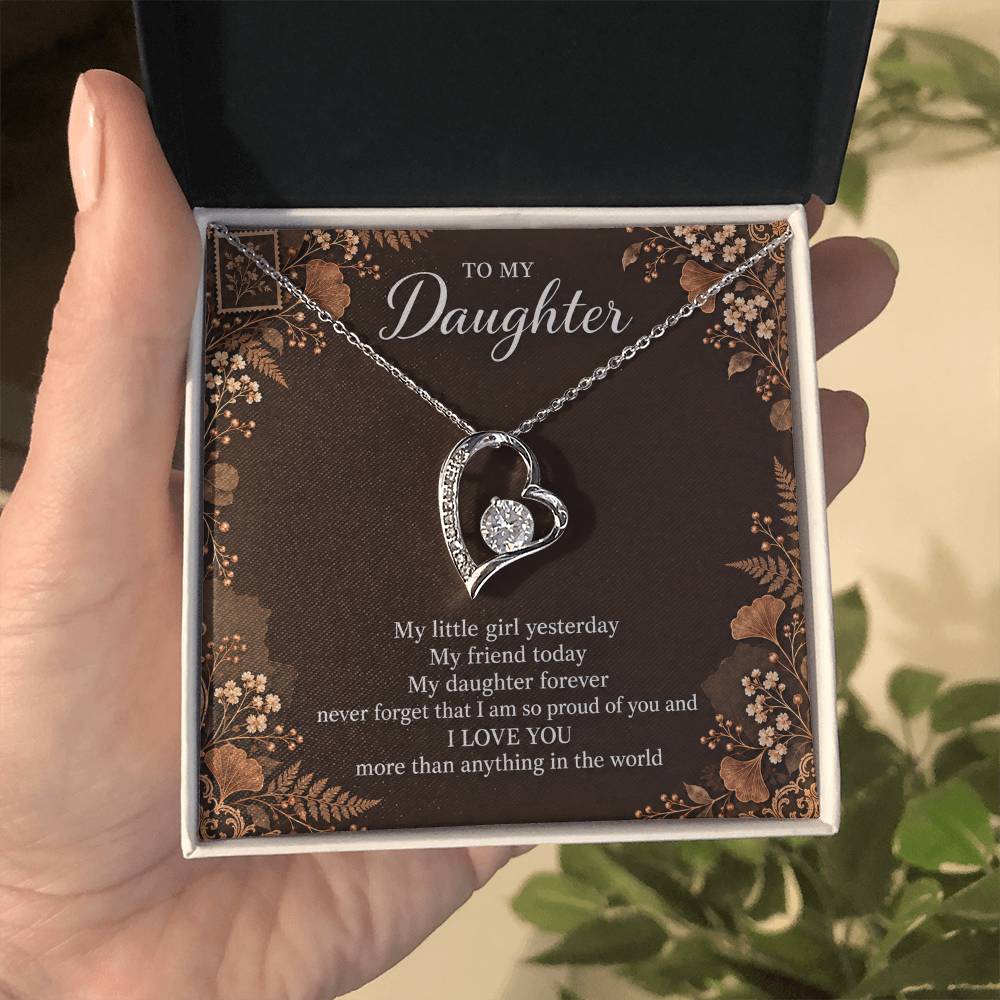 Gift for Daughter Forever Love necklace with Espresso Poet Letter message card in White Gold Finish – standard box held in hand | Hensley London