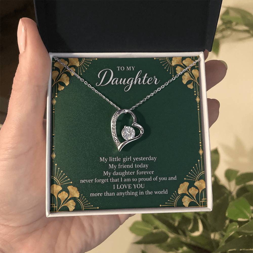 Gift for Daughter Forever Love necklace with Emerald Neo Deco message card in White Gold Finish – standard box held in hand | Hensley London