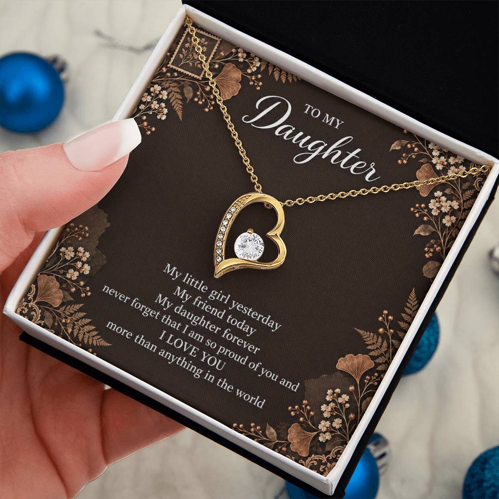 Gift for Daughter Forever Love necklace with Espresso Poet Letter message card in Yellow Gold Finish – standard box held in hand | Hensley London