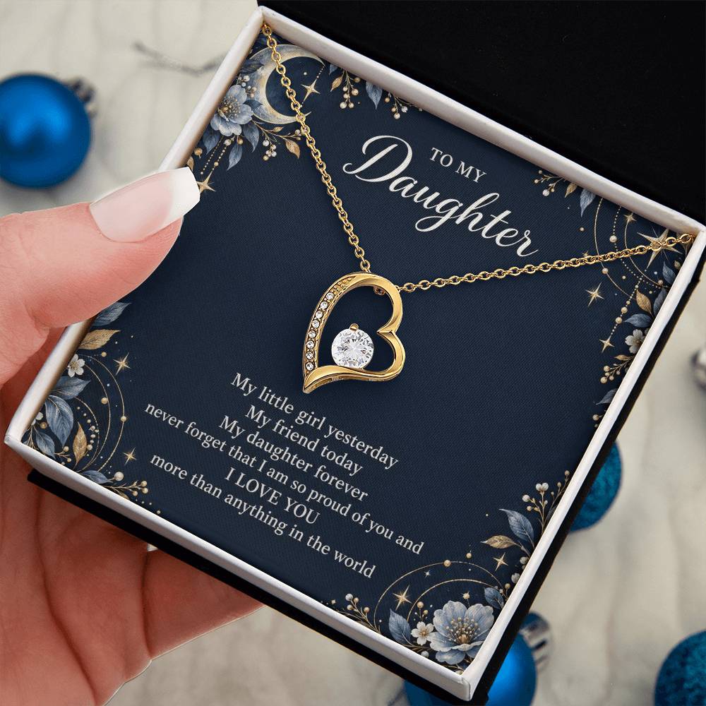 Gift for Daughter Forever Love necklace with Navy Starlight message card in Yellow Gold Finish – standard box held in hand | Hensley London