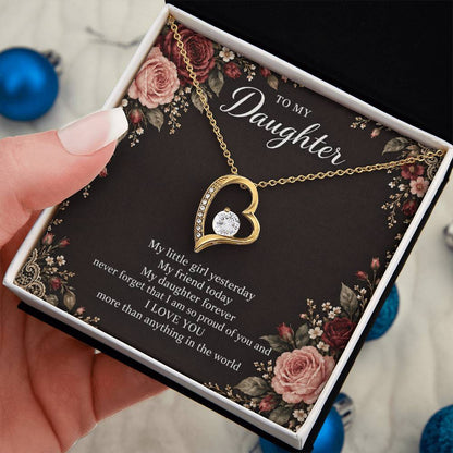 Gift for Daughter Forever Love necklace with Midnight Rose Lace message card in Yellow Gold Finish – standard box held in hand | Hensley London