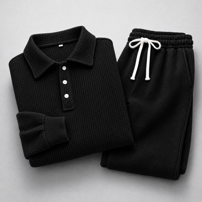 Men's Waffle-Knit Polo and Drawstring Trouser Set in Black – folded detail view | Hensley London