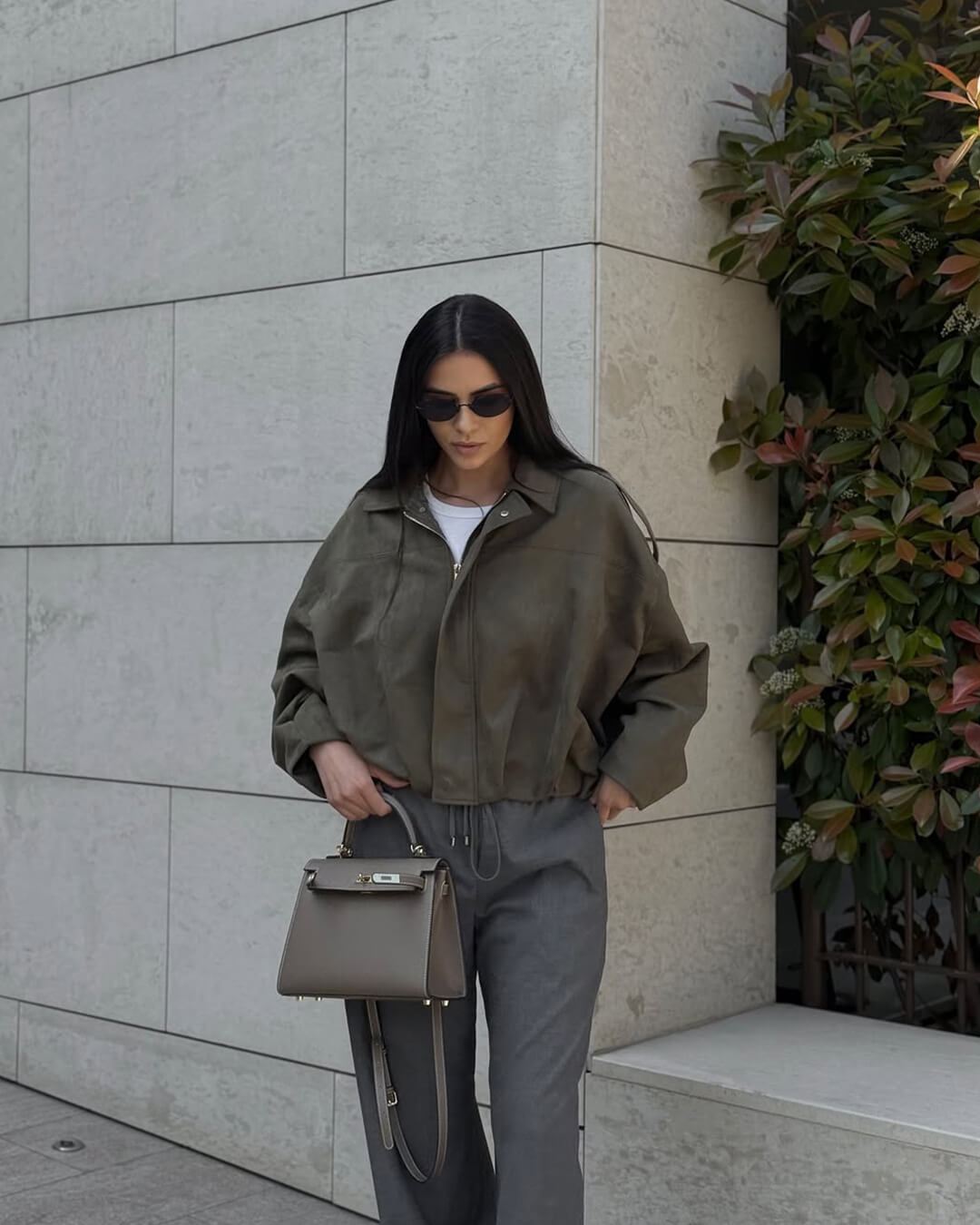 Women's Faux Suede Collared Bomber Jacket in Green - lifestyle view | Hensley London