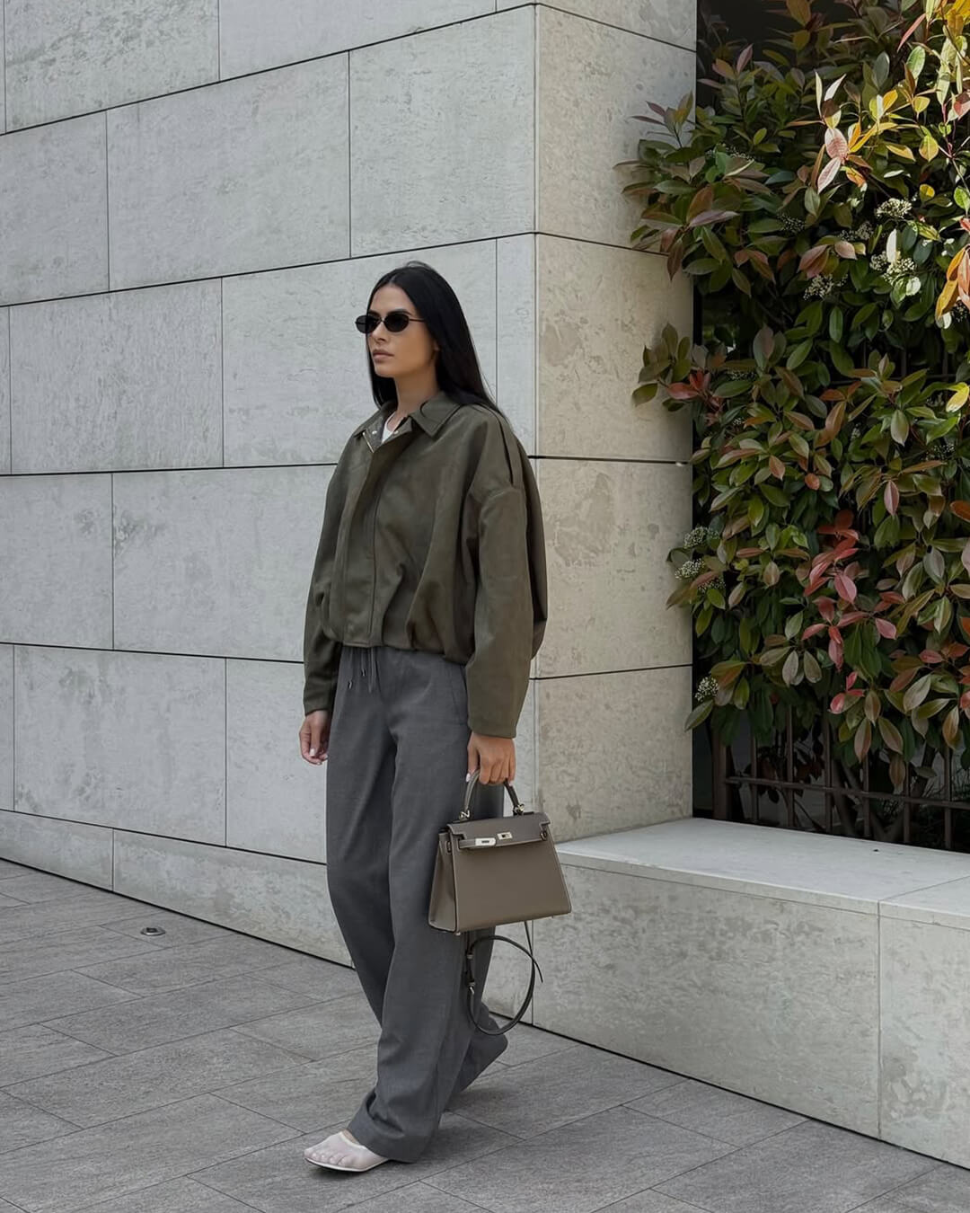 Women's Faux Suede Collared Bomber Jacket in Green - lifestyle view | Hensley London