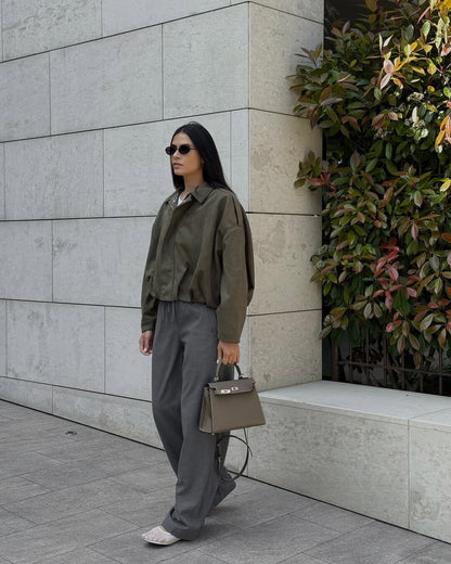 Women's Faux Suede Collared Bomber Jacket in Green - lifestyle view | Hensley London