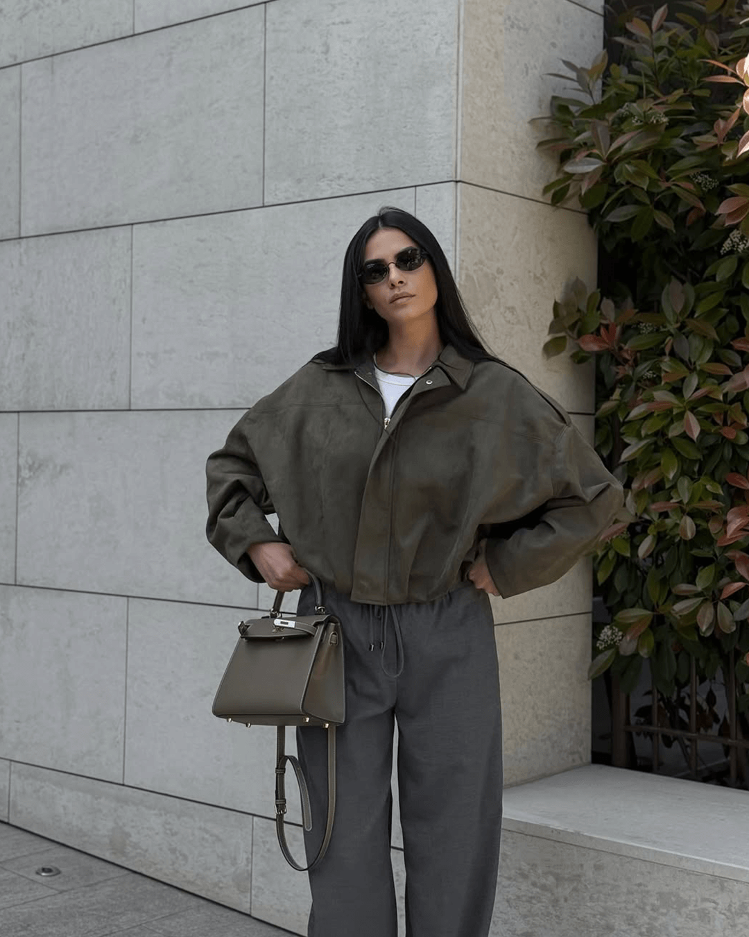 Women's Faux Suede Collared Bomber Jacket in Green - lifestyle view | Hensley London