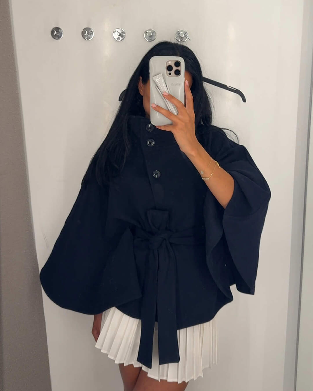 Women's High-Neck Belted Cape Jacket in Navy - lifestyle view | Hensley London