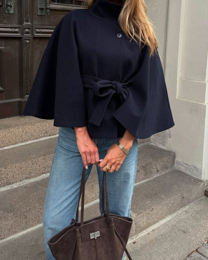 Women's High-Neck Belted Cape Jacket in Navy - lifestyle view | Hensley London