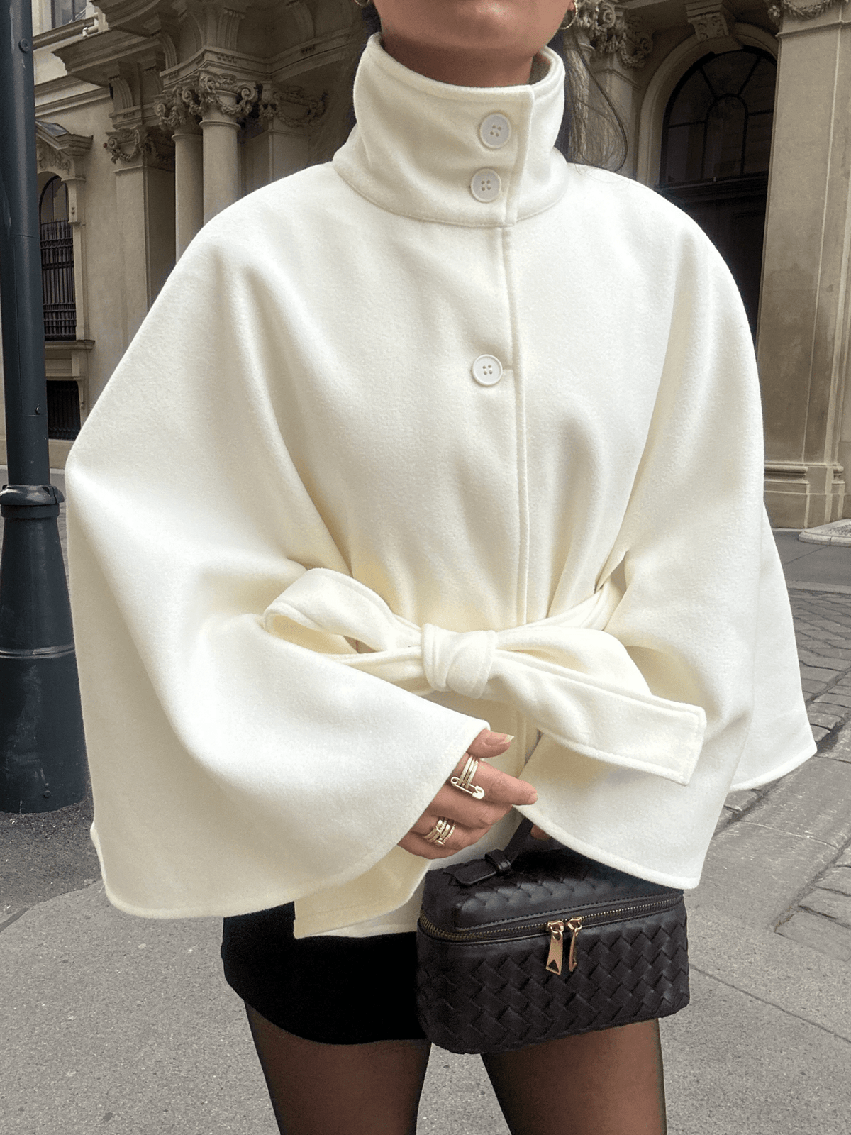 Women's High-Neck Belted Cape Jacket in White - front view | Hensley London