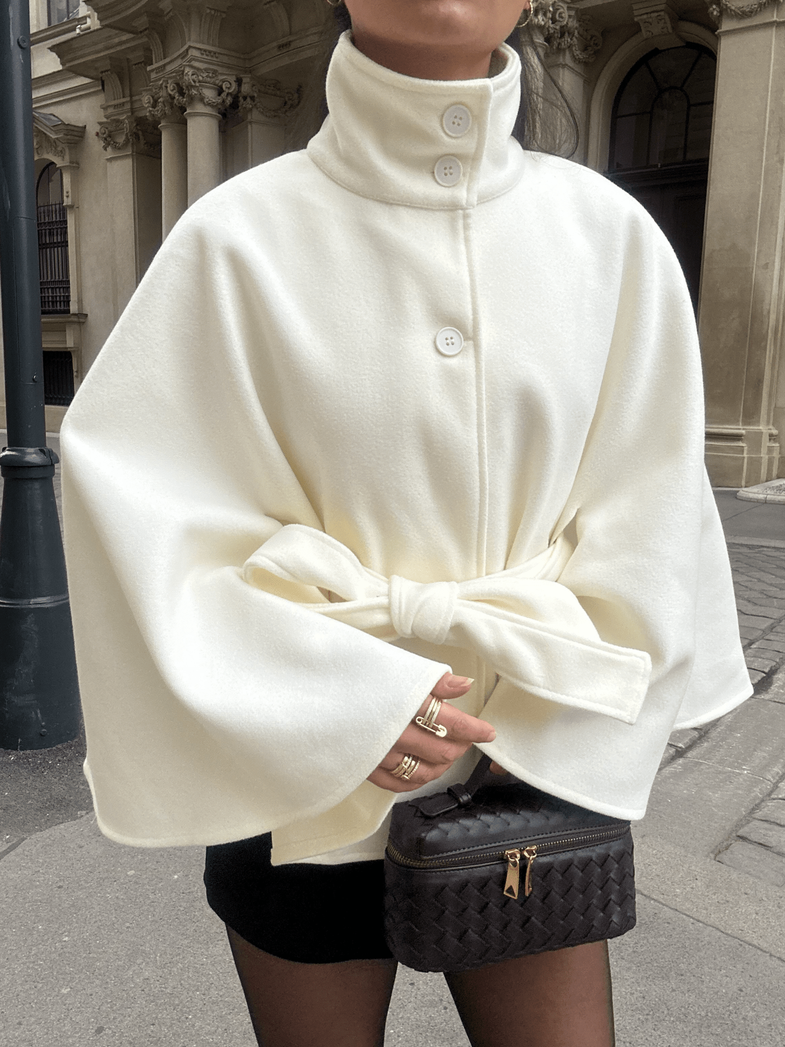 Women's High-Neck Belted Cape Jacket in White - front view | Hensley London
