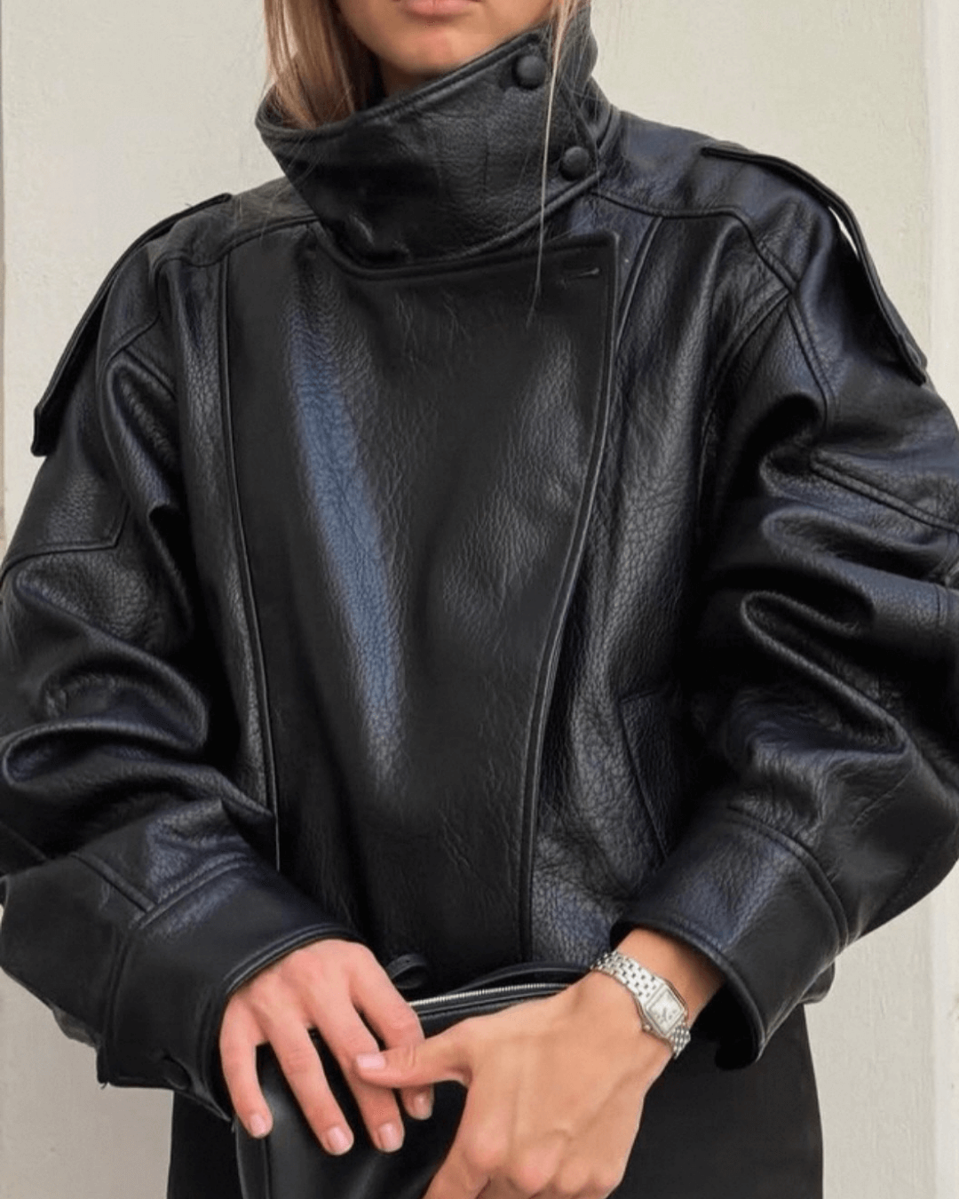 Women's Vegan Leather Asymmetrical Zip Jacket in Black - lifestyle view | Hensley London