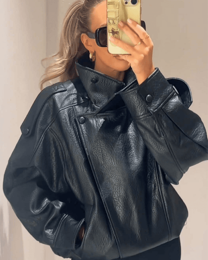 Women's Vegan Leather Asymmetrical Zip Jacket in Black - lifestyle view | Hensley London
