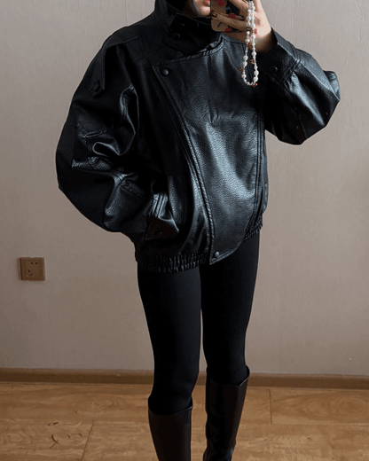 Women's Vegan Leather Asymmetrical Zip Jacket in Black - lifestyle view | Hensley London