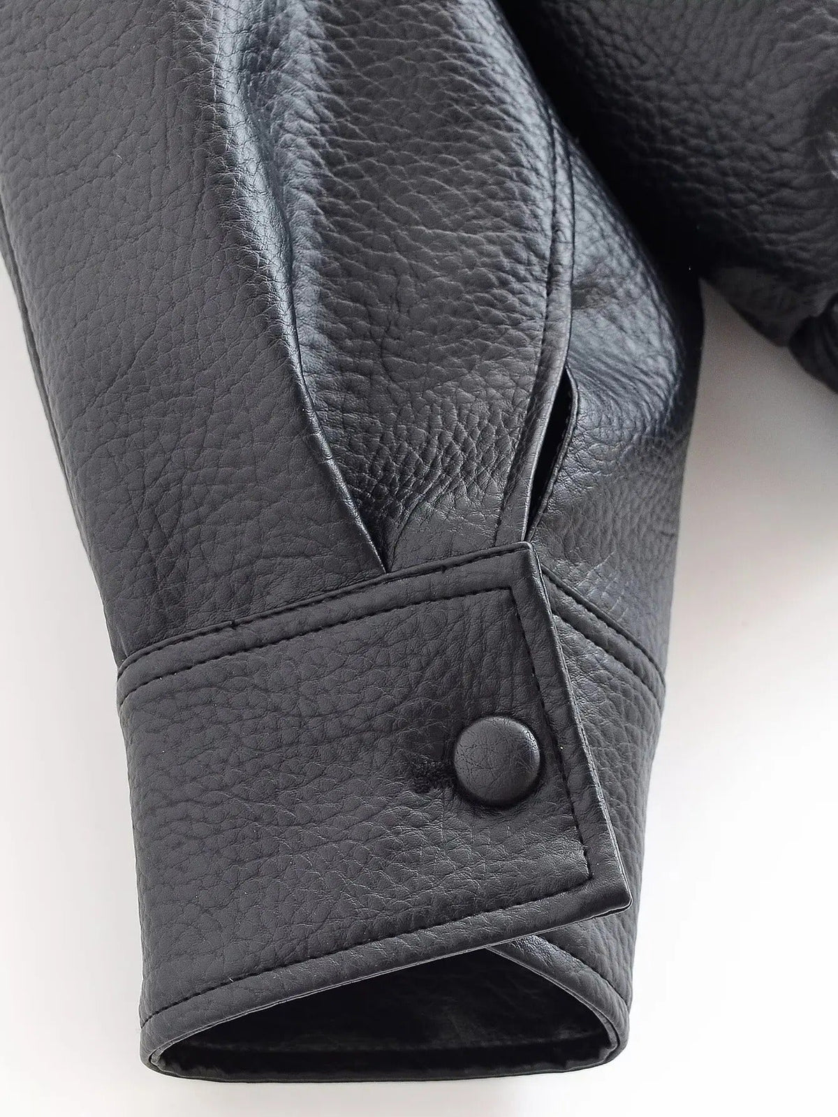 Women's Vegan Leather Asymmetrical Zip Jacket in Black - cuff detail | Hensley London