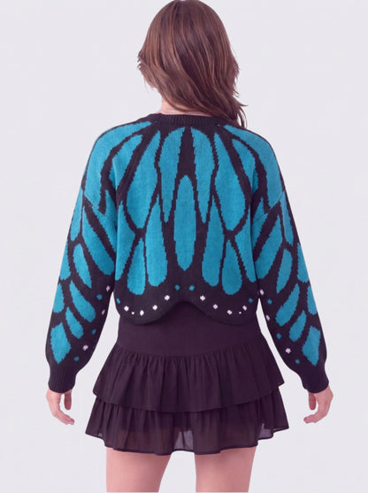 Women's Butterfly Knit Cardigan in Light Blue – back view on model | Hensley London
