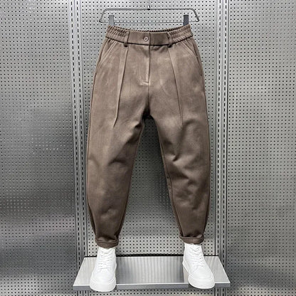 Men's Pleated Tapered Trousers with Belt Loops in Brown – front view | Hensley London