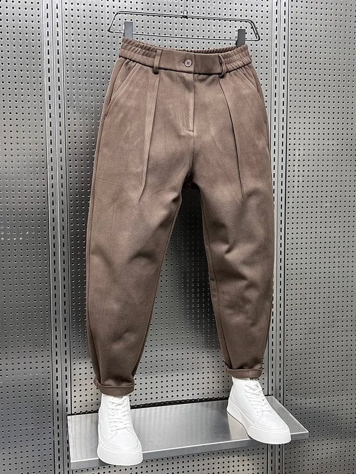 Men's Pleated Tapered Trousers with Belt Loops in Brown – angled front view | Hensley London