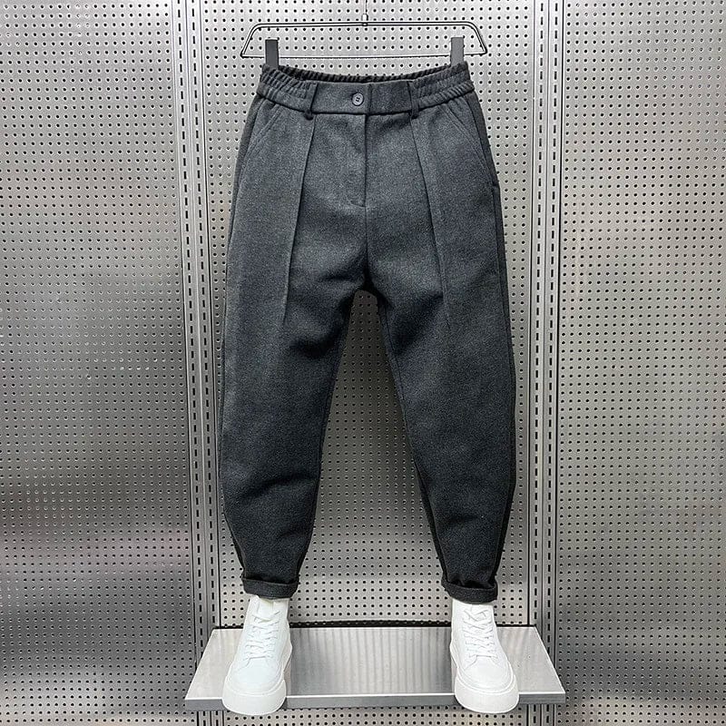 Men's Pleated Tapered Trousers with Belt Loops in Dark Gray – front view | Hensley London