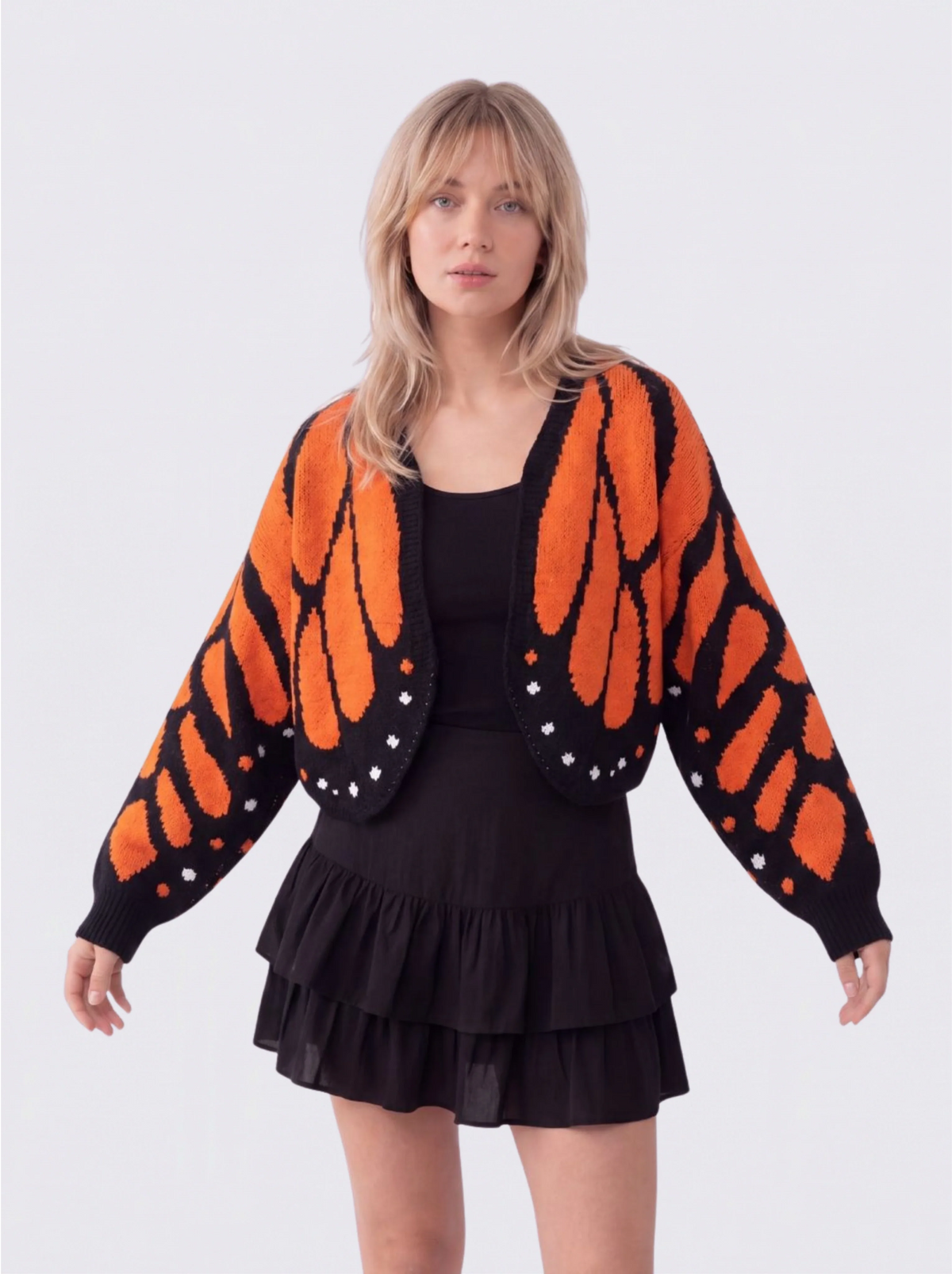 Women's Butterfly Knit Cardigan in Orange – front view on model | Hensley London