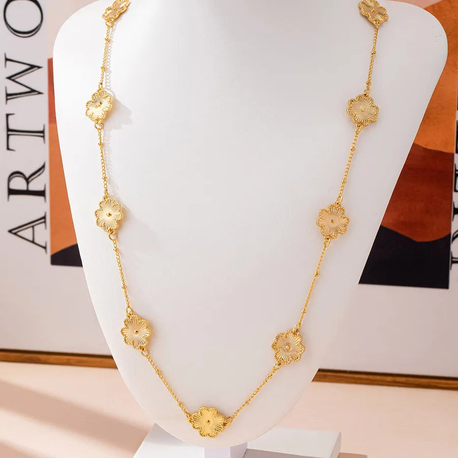 Women's Gold Floral Station Long Chain Necklace - View 2 | Hensley London