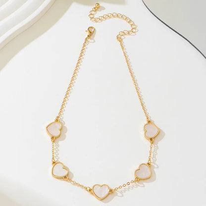 Women's Shell Heart Station Choker Necklace - View 7 | Hensley London