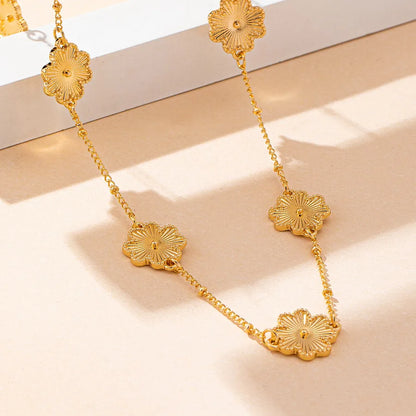 Women's Gold Floral Station Long Chain Necklace - View 4 | Hensley London