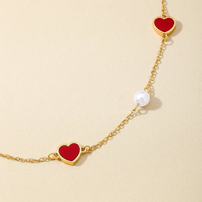 Women's Red Heart Pearl Station Necklace - View 5 | Hensley London
