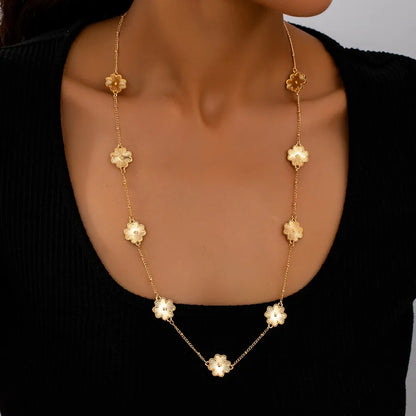 Women's Gold Floral Station Long Chain Necklace - View 1 | Hensley London