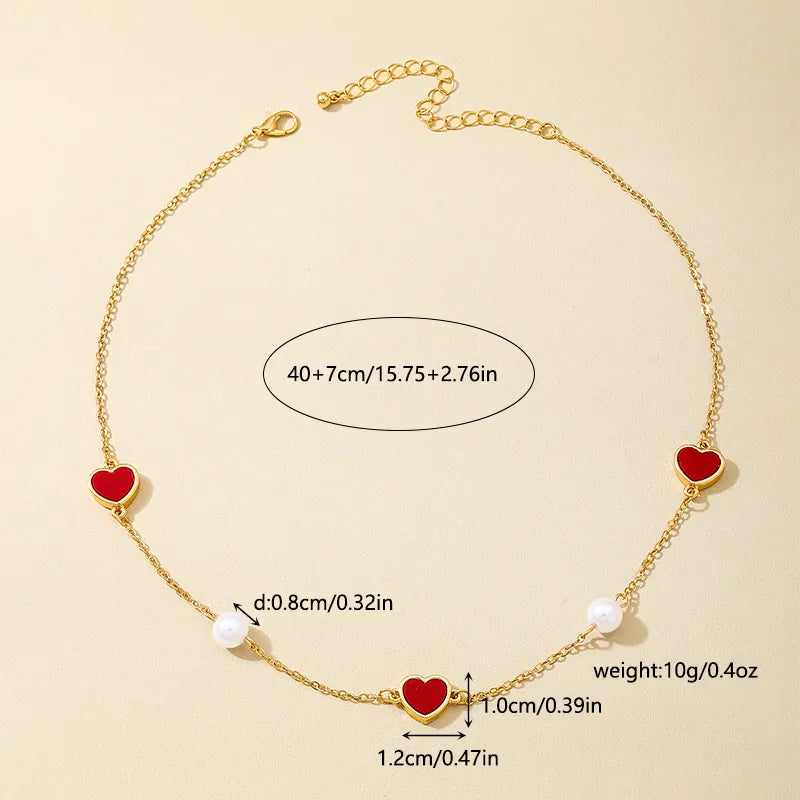 Women's Red Heart Pearl Station Necklace - View 4 | Hensley London